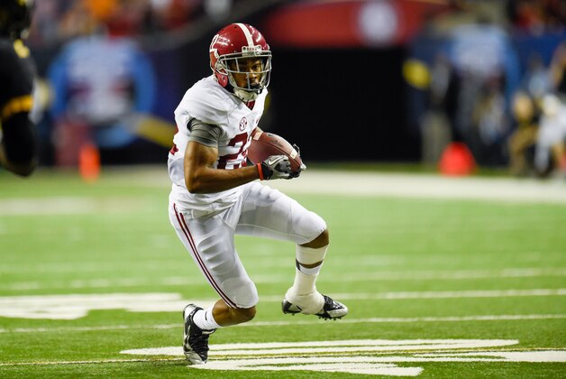Dec 6, 2014; Atlanta, GA, USA; Alabama Crimson Tide wide receiver Christion Jones (22) carries the ball during the 2014 SEC Championship Game against the Missouri Tigers at the Georgia Dome. Mandatory Credit: Kevin Liles-USA TODAY Sports.