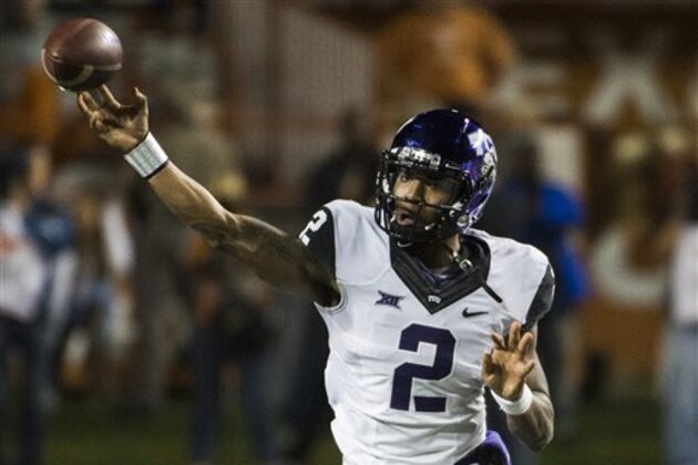 CORRECTS NAME OF TCU PLAYER TO TREVONE BOYKIN - TCU quarterback Trevone Boykin (2) throws a pass during the first half of an NCAA college football game against Texas, Thursday, Nov. 27, 2014, in Austin, Texas. (AP Photo/Ashley Landis)