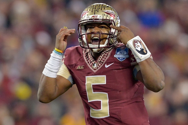 CHARLOTTE, NC - DECEMBER 06:  Jameis Winston #5 of the Florida State Seminoles calls an audible against the Georgia Tech Yellow Jackets during the Atlantic Coast Conference championship game on December 6, 2014 in Greenville, North Carolina. Florida State won 37-35.  (Photo by Grant Halverson/Getty Images)