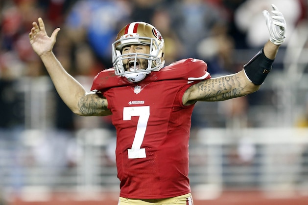 Dec 20, 2014; Santa Clara, CA, USA; San Francisco 49ers quarterback Colin Kaepernick (7) celebrates after rushing for a touchdown during the third quarter against the San Diego Chargers at Levi's Stadium. Mandatory Credit: Bob Stanton-USA TODAY Sports