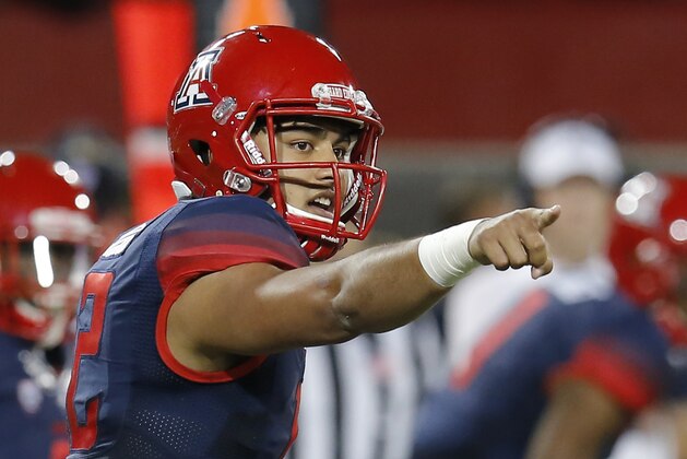 Arizona quarterback Anu Solomon (12) during the first half of an NCAA college football game against Colorado, Saturday, Nov. 8, 2014, in Tucson, Ariz. (AP Photo/Rick Scuteri)