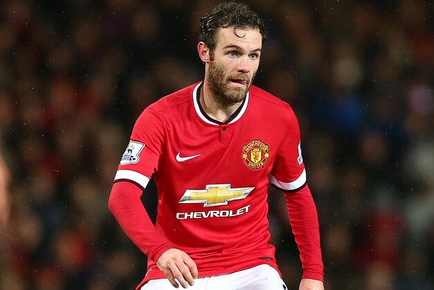 MANCHESTER, ENGLAND - DECEMBER 26:  Juan Mata of Manchester United in action during the Barclays Premier League match between Manchester United and Newcastle United at Old Trafford on December 26, 2014 in Manchester, England.  (Photo by Clive Brunskill/Getty Images)