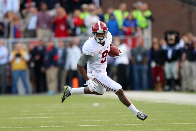 OXFORD, MS - OCTOBER 4: Amari Cooper #9 of the Alabama Crimson Tide runs after the catch against the Ole Miss Rebels on October 4, 2014 at Vaught-Hemingway Stadium in Oxford, Mississippi. Mississippi beat Alabama 23-17. (Photo by Joe Murphy/Getty Images)