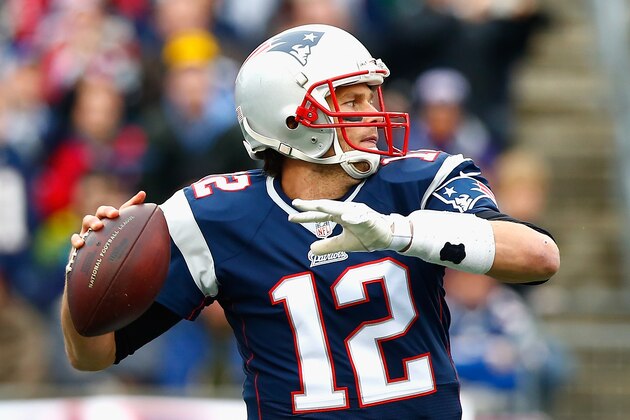 FOXBORO, MA - DECEMBER 28:  Tom Brady #12 of the New England Patriots passes the ball during the first quarter against the Buffalo Bills at Gillette Stadium on December 28, 2014 in Foxboro, Massachusetts.  (Photo by Jared Wickerham/Getty Images)