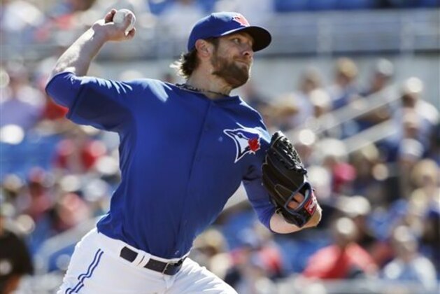 Toronto Blue Jays pitcher Kyle Drabek delivers in the seventh inning of a spring training baseball game against the Minnesota Twins in Dunedin, Fla., Saturday, March 8, 2014. (AP Photo/Kathy Willens)