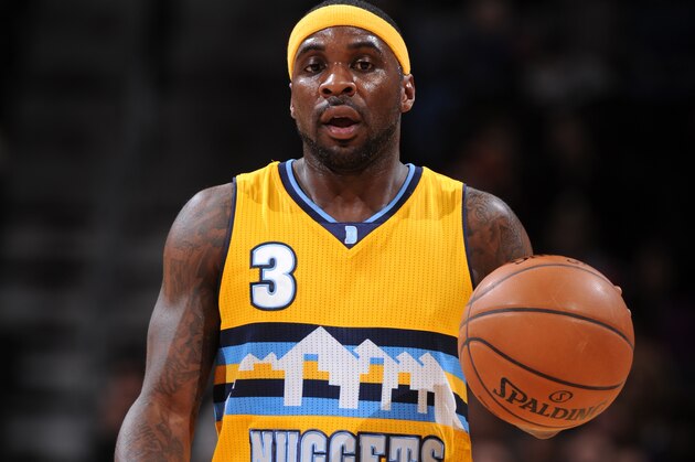 DENVER, CO - DECEMBER 26:  Ty Lawson #3 of the Denver Nuggets brings the ball up court against the Minnesota Timberwolves on December 26, 2014 at the Pepsi Center in Denver, Colorado. NOTE TO USER: User expressly acknowledges and agrees that, by downloading and or using this Photograph, user is consenting to the terms and conditions of the Getty Images License Agreement. Mandatory Copyright Notice: Copyright 2014 NBAE (Photo by Garrett Ellwood/NBAE via Getty Images)