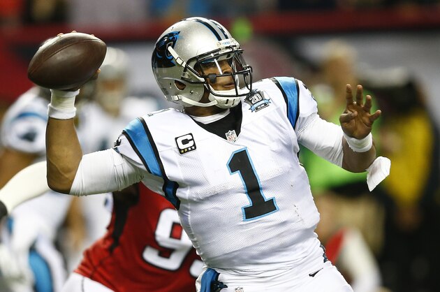 Carolina Panthers quarterback Cam Newton (1) works against the Atlanta Falcons during the first half of an NFL football game, Sunday, Dec. 28, 2014, in Atlanta. (AP Photo/John Bazemore)