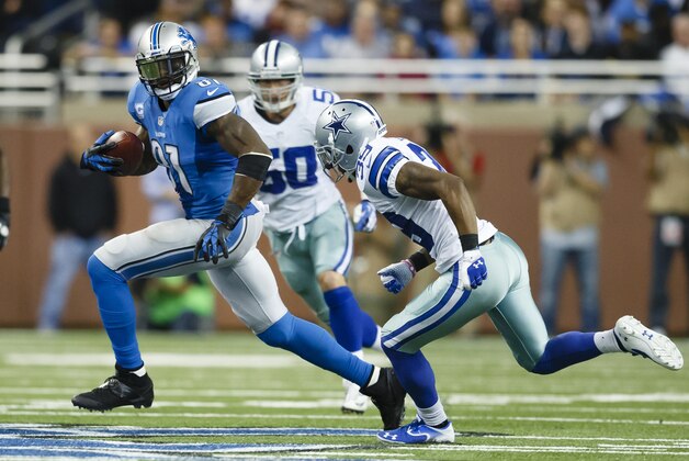 Detroit Lions wide receiver Calvin Johnson (81) runs the ball after making a reception as Dallas Cowboys cornerback Brandon Carr (39) chases him during an NFL football game in Detroit, Sunday, Oct. 27, 2013. (AP Photo/Rick Osentoski) Detroit Lions wide receiver Calvin Johnson (81) runs the ball after making a reception as Dallas Cowboys cornerback Brandon Carr (39) chases him during an NFL football game in Detroit, Sunday, Oct. 27, 2013. (AP Photo/Rick Osentoski)