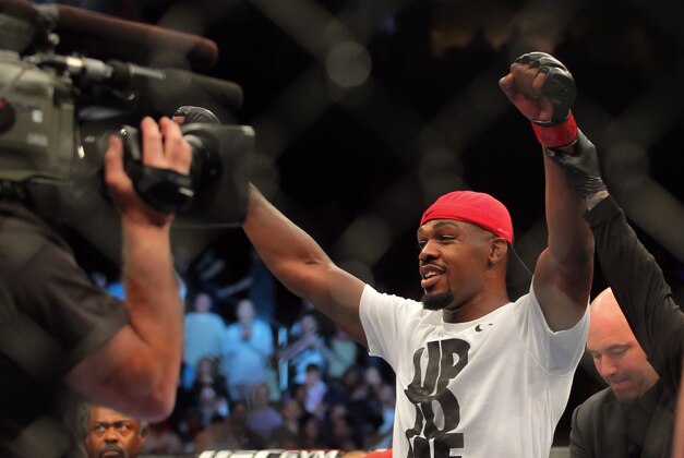 Apr 27, 2013; Newark, NJ, USA; Jon Jones (black shorts) celebrates defeating Chael Sonnen (white shorts)during UFC 159 at the Prudential Center. Mandatory Credit: Brad Penner-USA TODAY Sports
