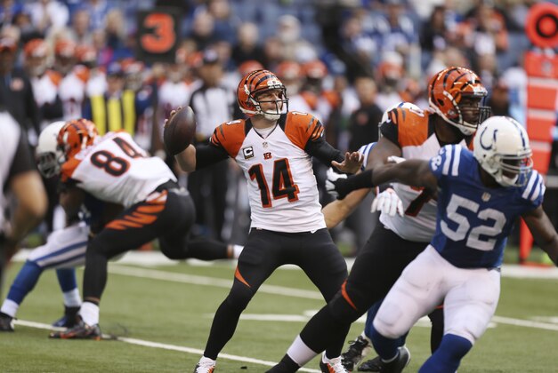 Oct 19, 2014; Indianapolis, IN, USA;  Cincinnati Bengals quarterback Andy Dalton (14) throws a pass against the Indianapolis Colts at Lucas Oil Stadium. Mandatory Credit: Brian Spurlock-USA TODAY Sports