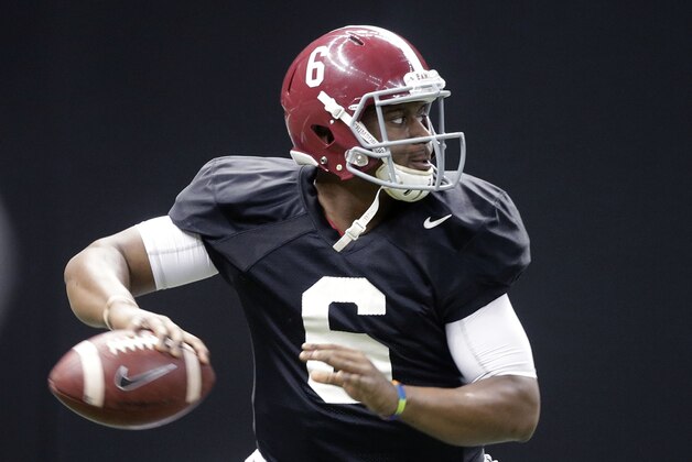 Alabama quarterback Blake Sims (6) drops back to pass during practice at the Mercedes-Benz Superdome in New Orleans, Monday, Dec. 29, 2014. They will square off against Ohio State in the Allstate Sugar Bowl NCAA football game, which will be played Jan. 1, 2015. (AP Photo/Gerald Herbert)