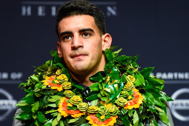 NEW YORK, NY - DECEMBER 13:  Oregon Ducks quarterback Marcus Mariota speaks to the media during a press conference after the 2014 Heisman Trophy presentation at the New York Marriott Marquis on December 13, 2014 in New York City.  (Photo by Alex Goodlett/Getty Images)