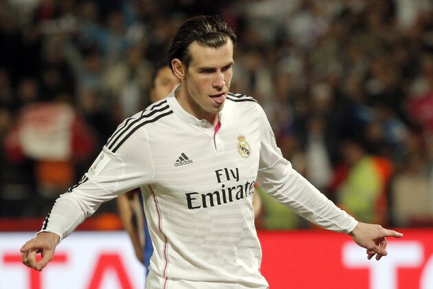 Real Madrid’s Gareth Bale reacts after scoring during the semi final soccer match between Real Madrid and Cruz Azul at the Club World Cup soccer tournament in Marrakech, Morocco, Tuesday, Dec. 16, 2014. (AP Photo/Christophe Ena)