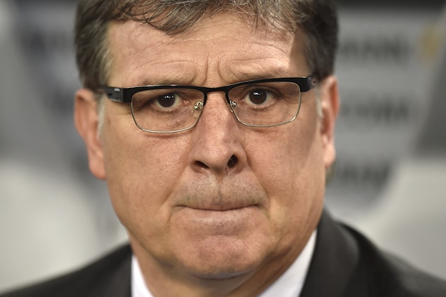 Argentina's head coach Gerardo Martino waits for the beginning of the friendly soccer match between Germany and Argentina in Duesseldorf, Germany, Wednesday, Sept. 3, 2014. (AP Photo/Martin Meissner)