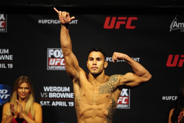 Apr 18, 2014; Orlando, FL, USA; Brad Tavares poses on the scale during a weigh-in for his middleweight fight against Yoel Romero on UFC on FOX 11 at Amway Center. Mandatory Credit: David Manning-USA TODAY Sports