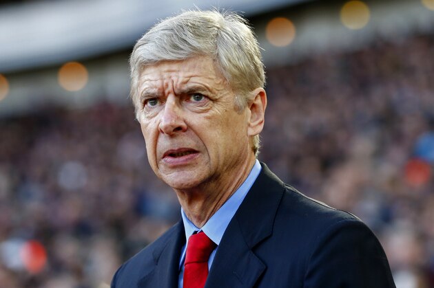 LONDON, ENGLAND - DECEMBER 28:  Arsene Wenger, manager of Arsenal looks on before the Barclays Premier League match between West Ham United and Arsenal at Boleyn Ground on December 28, 2014 in London, England.  (Photo by Julian Finney/Getty Images)
