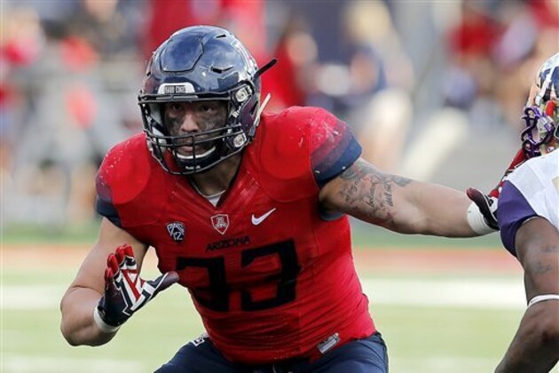 Arizona linebacker Scooby Wright III (33) during the first half of an NCAA college football game against Washington, Saturday, Nov. 15, 2014, in Tucson, Ariz. (AP Photo/Rick Scuteri)