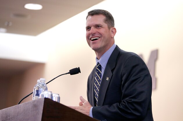 ANN ARBOR, MI - DECEMBER 30:  Jim Harbaugh speaks as he is introduced as the new Head Coach of the University of Michigan football team at the Junge Family Champions Center on December 30, 2014 in Ann Arbor, Michigan.  (Photo by Gregory Shamus/Getty Images)