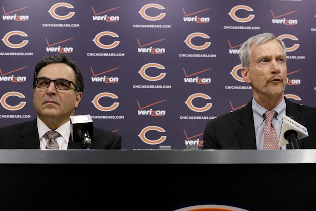 Chicago Bears President and CEO Ted Phillips, left, and Chairman George H. McCaskey listen to question at a news conference at Halas Hall on Monday, Dec. 29, 2014, in Lake Forest, Ill. Chicago Bears head coach Marc Trestman and general manager Phil Emery were fired Monday. (AP Photo/Nam Y. Huh)