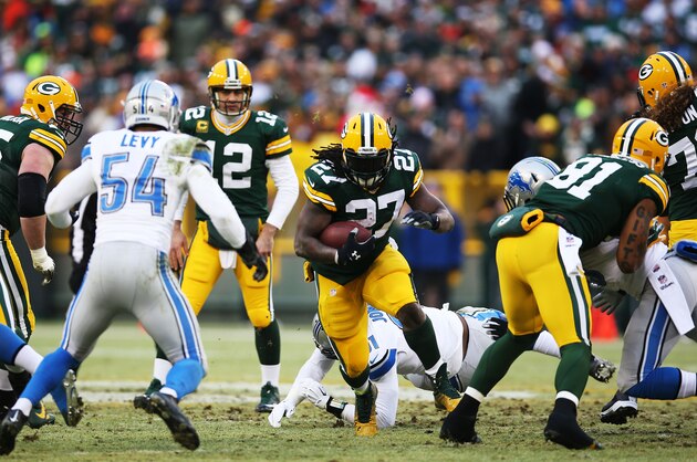 GREEN BAY, WI - DECEMBER 28:   Eddie Lacy #27 of the Green Bay Packers carries the ball against the Detroit Lions in the first quarter at Lambeau Field on December 28, 2014 in Green Bay, Wisconsin.  (Photo by Chris Graythen/Getty Images)