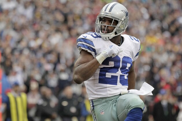 Dallas Cowboys running back DeMarco Murray (29) celebrates his touchdown during the first half of an NFL football game against the Washington Redskins in Landover, Md., Sunday, Dec. 28, 2014. (AP Photo/Mark Tenally)