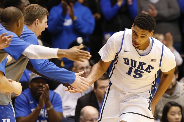 Duke's Jahlil Okafor (15) celebrates with teammates during the second half of an NCAA college basketball game against Toledo, Monday, Dec. 29, 2014 in Durham, N.C. (AP Photo/Ellen Ozier)