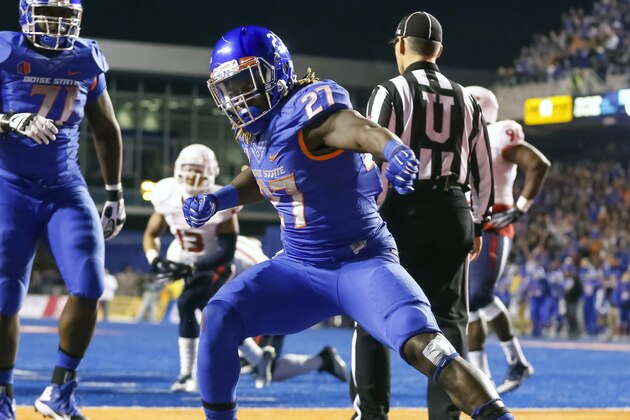 Boise State running back Jay Ajayi (27) celebrates after his touchdown during the first half of the Mountain West Conference championship NCAA college football game against Fresno State in Boise, Idaho, on Saturday, Dec. 6, 2014. (AP Photo/Otto Kitsinger)