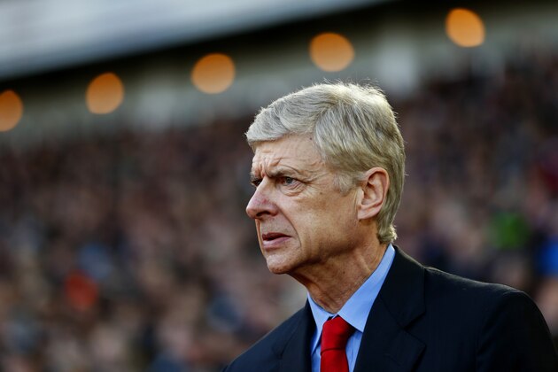 LONDON, ENGLAND - DECEMBER 28:  Arsene Wenger, manager of Arsenal looks on before the Barclays Premier League match between West Ham United and Arsenal at Boleyn Ground on December 28, 2014 in London, England.  (Photo by Julian Finney/Getty Images)