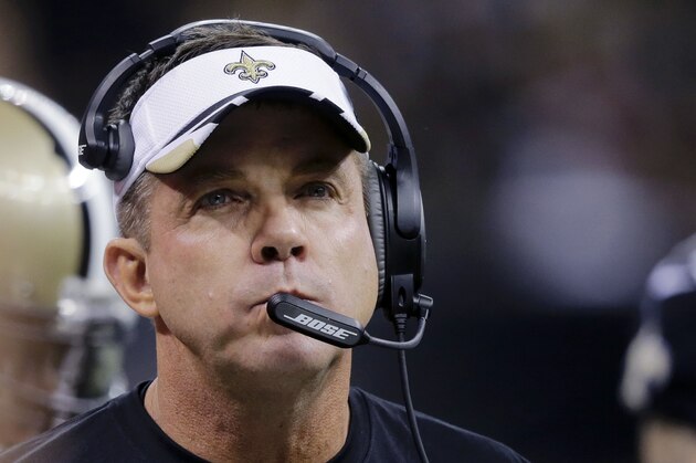 New Orleans Saints head coach Sean Payton walks the sidelines in the first half of an NFL football game against the Atlanta Falcons in New Orleans, Sunday, Dec. 21, 2014. (AP Photo/Bill Haber)