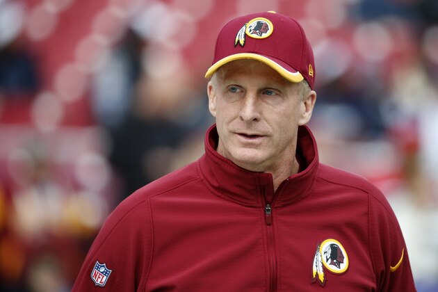Washington Redskins Defensive Coordinator Jim Haslett walks across the field before an NFL football game against the Dallas Cowboys in Landover, Md., Sunday, Dec. 28, 2014. (AP Photo/Alex Brandon)