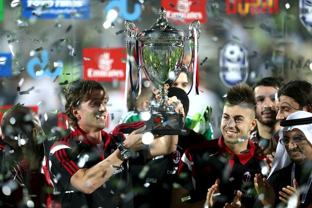 DUBAI, UNITED ARAB EMIRATES - DECEMBER 30:  Riccardo Montolivo, Captain of AC Milan lifts the trophy during the Dubai Football Challenge match between AC Milan and Real Madrid at The Sevens Stadium on December 30, 2014 in Dubai, United Arab Emirates.  (Photo by Warren Little/Getty Images)