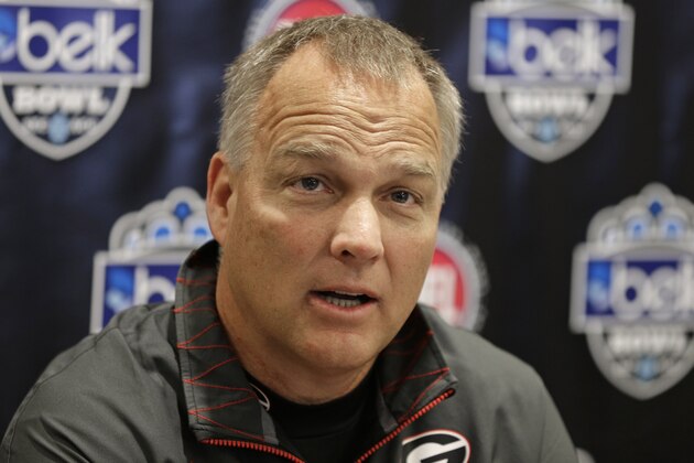 Georgia head coach Mark Richt answers a question during a news conference for the Belk Bowl NCAA college football game in Charlotte, N.C., Monday, Dec. 29, 2014. Georgia will face Louisville in the Belk Bowl on Tuesday, Dec. 30. (AP Photo/Chuck Burton)