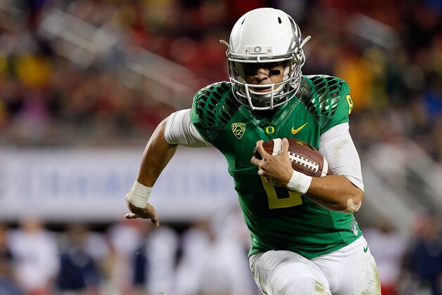 SANTA CLARA, CA - DECEMBER 05: Marcus Mariota #8 of the Oregon Ducks scrambles in the first half against the Arizona Wildcats during the PAC-12 Championships at Levi's Stadium on December 5, 2014 in Santa Clara, California. (Photo by Brian Bahr/Getty Images)