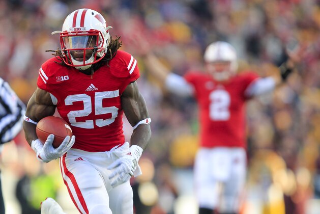 Wisconsin running back Melvin Gordon runs against Minnesota during the first half of an NCAA college football game Saturday, Nov. 29, 2014, in Madison, Wis. (AP Photo/Andy Manis)