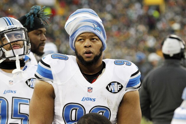 Detroit Lions' Ndamukong Suh during the first half of an NFL football game against the Green Bay Packers Sunday, Dec. 28, 2014, in Green Bay, Wis. (AP Photo/Matt Ludtke)