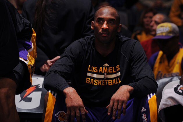 DENVER, CO - December 30:  Kobe Bryant #24 of the Los Angeles Lakers before the game against the Denver Nuggets on December 30, 2014 at the Pepsi Center in Denver, Colorado. NOTE TO USER: User expressly acknowledges and agrees that, by downloading and/or using this Photograph, user is consenting to the terms and conditions of the Getty Images License Agreement. Mandatory Copyright Notice: Copyright 2014 NBAE (Photo by Bart Young/NBAE via Getty Images)