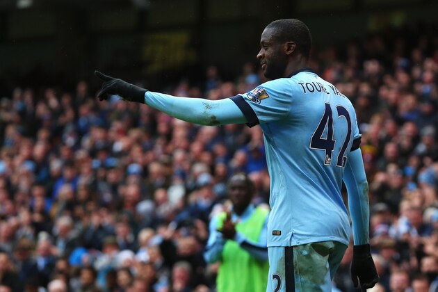 MANCHESTER, ENGLAND - DECEMBER 20:  Yaya Toure of Manchester City celebrates his goal during the Barclays Premier League match between Manchester City and Crystal Palace at Etihad Stadium on December 20, 2014 in Manchester, England.  (Photo by Alex Livesey/Getty Images)