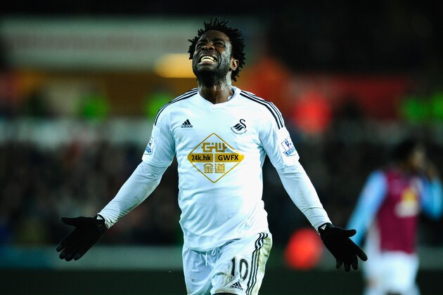 SWANSEA, WALES - DECEMBER 26:  Wilfried Bony of Swansea reacts after having a goal dissalowed during the Barclays Premier League match between Swansea City and Aston Villa at Liberty Stadium on December 26, 2014 in Swansea, Wales.  (Photo by Stu Forster/Getty Images)