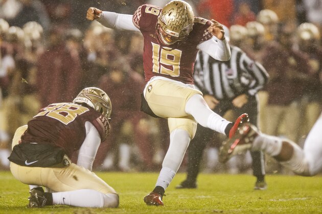 TALLAHASSEE, FL - NOVEMBER 22: Kicker Roberto Aguayo #19 of the Florida State Seminoles kicks the game winning field goal against the Boston College Eagles during the game at Doak Campbell Stadium on November 22, 2014 in Tallahassee, Florida. The Seminoles defeated the Eagles 20-17. (Photo by Jeff Gammons/Getty Images)