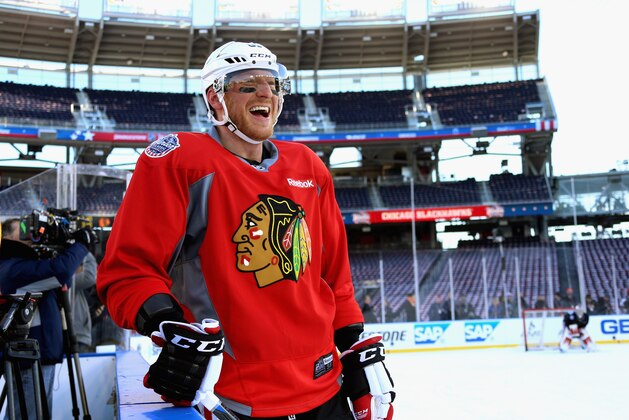 WASHINGTON, DC - DECEMBER 31:  Marian Hossa #81 of the Chicago Blackhawks laughs during practice for the 2015 Bridgestone NHL Winter Classic on December 31, 2014 at Nationals Park in Washington, DC.  The 2015 Bridgestone NHL Winter Classic will take place on New Year's Day with the Washington Capitals playing the Chicago Blackhawks.  (Photo by Dave Sandford/NHLI via Getty Images)