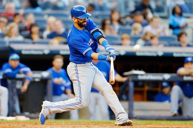 NEW YORK, NY - SEPTEMBER 20:  Jose Bautista #19 of the Toronto Blue Jays connects on a seventh inning home run against the New York Yankees at Yankee Stadium on September 20, 2014 in the Bronx borough of New York City.  (Photo by Jim McIsaac/Getty Images)
