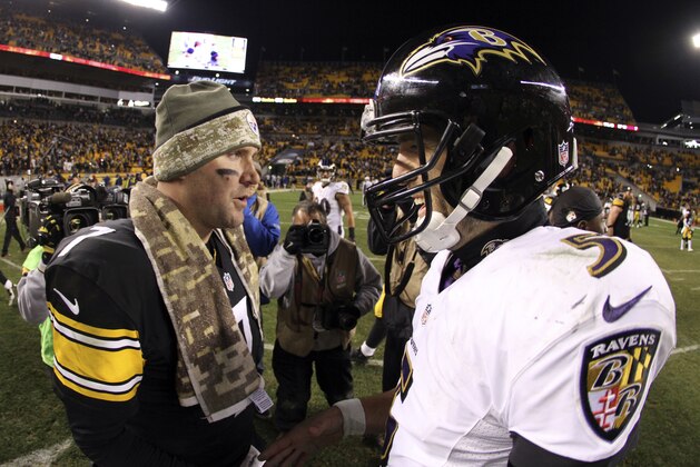 Pittsburgh Steelers quarterback Ben Roethlisberger, left, and Baltimore Ravens quarterback Joe Flacco (5) greet on the field after a 43-23 Steelers win in an NFL football game in Pittsburgh, Monday, Nov. 3, 2014. (AP Photo/Gene J. Puskar)