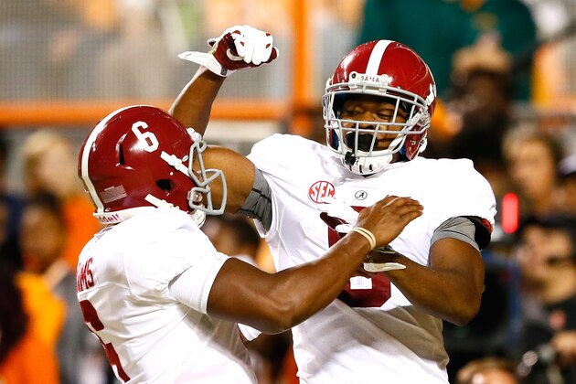KNOXVILLE, TN - OCTOBER 25:  Amari Cooper #9 of the Alabama Crimson Tide reacts after pulling in a reception for a touchdown from Blake Sims #6 against the Tennessee Volunteers at Neyland Stadium on October 25, 2014 in Knoxville, Tennessee.  (Photo by Kevin C. Cox/Getty Images)