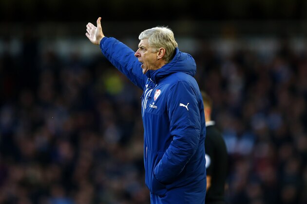 LONDON, ENGLAND - DECEMBER 28: Arsene Wenger, manager of Arsenal reacts during the Barclays Premier League match between West Ham United and Arsenal at Boleyn Ground on December 28, 2014 in London, England. (Photo by Julian Finney/Getty Images) LONDON, ENGLAND - DECEMBER 28: Arsene Wenger, manager of Arsenal reacts during the Barclays Premier League match between West Ham United and Arsenal at Boleyn Ground on December 28, 2014 in London, England. (Photo by Julian Finney/Getty Images)