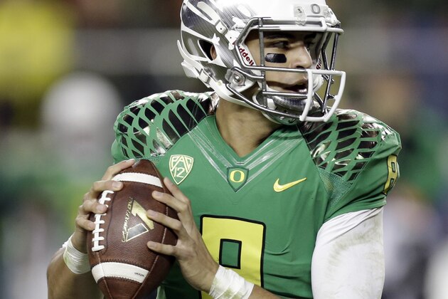 Oregon quarterback Marcus Mariota drops back to pass against Arizona during the second half of a Pac-12 Conference championship NCAA college football game Friday, Dec. 5, 2014, in Santa Clara, Calif. Oregon won the game, 51-13. (AP Photo/Ben Margot)