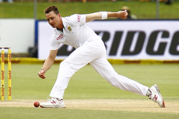 South Africa's Dale Steyn fields on the fourth day of the second test against West Indies in Port Elizabeth, South Africa, Monday, Dec. 29, 2014. (AP Photo/Michael Sheehan)