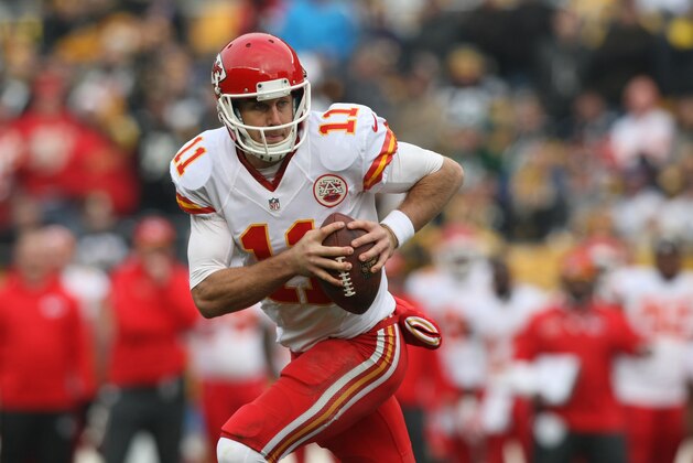 Dec 21, 2014; Pittsburgh, PA, USA; Kansas City Chiefs quarterback Alex Smith (11) looks to throw the ball against the Pittsburgh Steelers during the first half at Heinz Field. Mandatory Credit: Jason Bridge-USA TODAY Sports