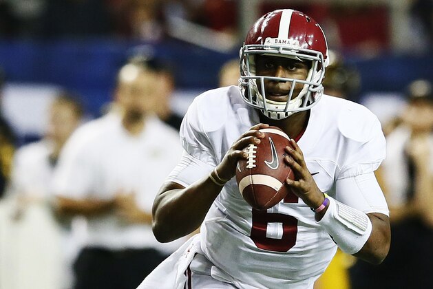 ATLANTA, GA - DECEMBER 06:  Blake Sims #6 of the Alabama Crimson Tide passes against the Missouri Tigers during the SEC Championship game at the Georgia Dome on December 6, 2014 in Atlanta, Georgia.  (Photo by Kevin C. Cox/Getty Images)