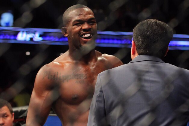 Apr 27, 2013; Newark, NJ, USA; Jon Jones (black shorts) celebrates defeating Chael Sonnen (white shorts)during UFC 159 at the Prudential Center. Mandatory Credit: Brad Penner-USA TODAY Sports