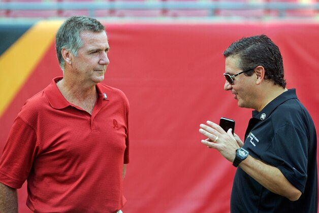 Aug 28, 2014; Tampa, FL, USA; Washington Redskins owner Daniel Snyder, right, talks with general manager Bruce Allen before Washington plays the Tampa Bay Buccaneers at Raymond James Stadium. Mandatory Credit: David Manning-USA TODAY Sports